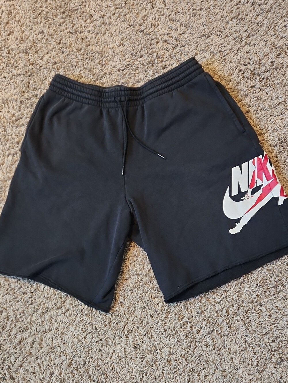 Nike Black Men's Logo Athletic Shorts with Red Accent